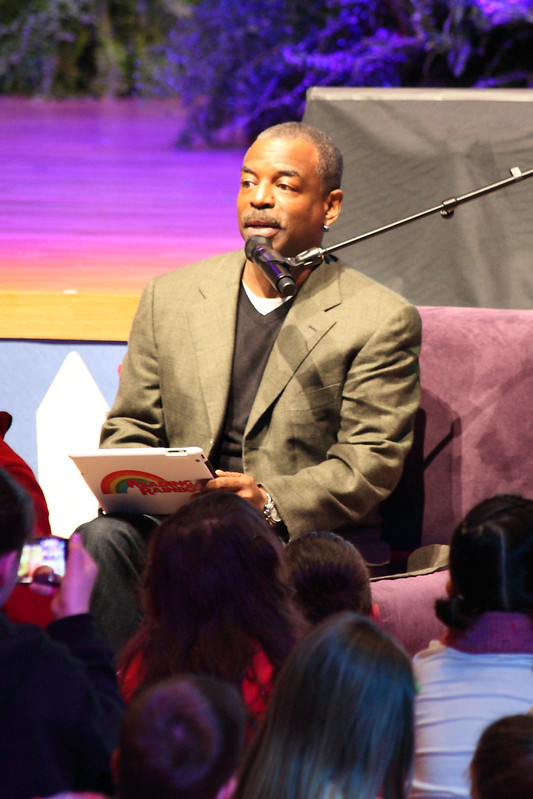Levar Burton 1 by Steven Miller Levar Burton on stage at Disneyland Hotel onstage in 2014 reading a book to a crowd